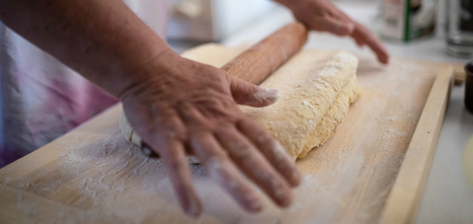 Hands and rolling pin